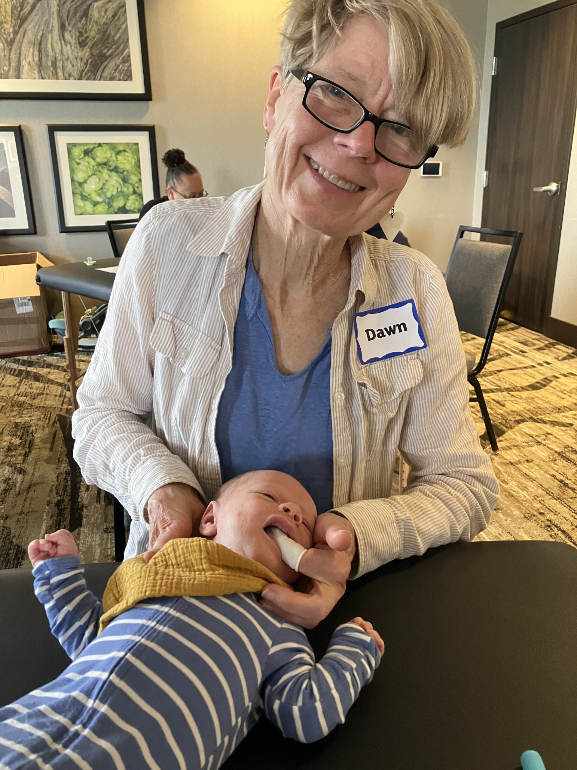 Dr. Dawn Diehnelt participating in craniosacral fascial therapy infant training